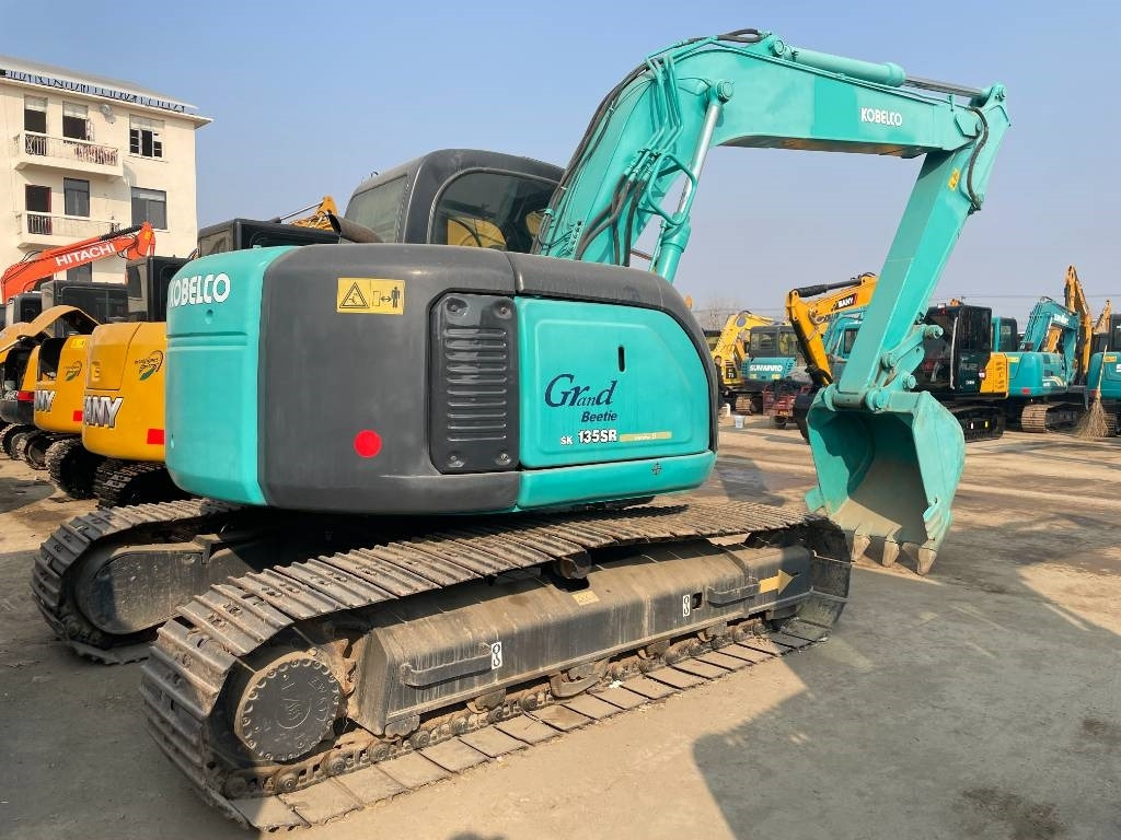 Kobelco SK 135 - Telakaivukone: kuva Kobelco SK 135 - Telakaivukone Kobelco SK 135 - Telakaivukone: kuva Kobelco SK 135 - Telakaivukone