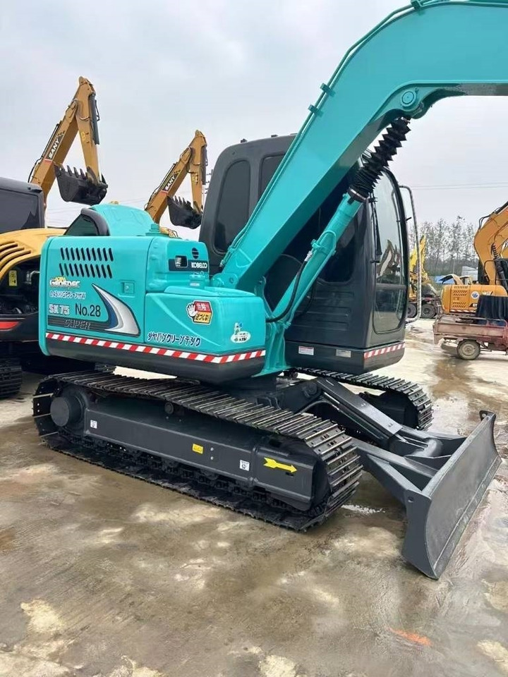 Kobelco SK 75 - Telakaivukone: kuva Kobelco SK 75 - Telakaivukone Kobelco SK 75 - Telakaivukone: kuva Kobelco SK 75 - Telakaivukone