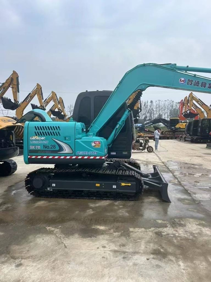 Kobelco SK 75 - Telakaivukone: kuva Kobelco SK 75 - Telakaivukone Kobelco SK 75 - Telakaivukone: kuva Kobelco SK 75 - Telakaivukone