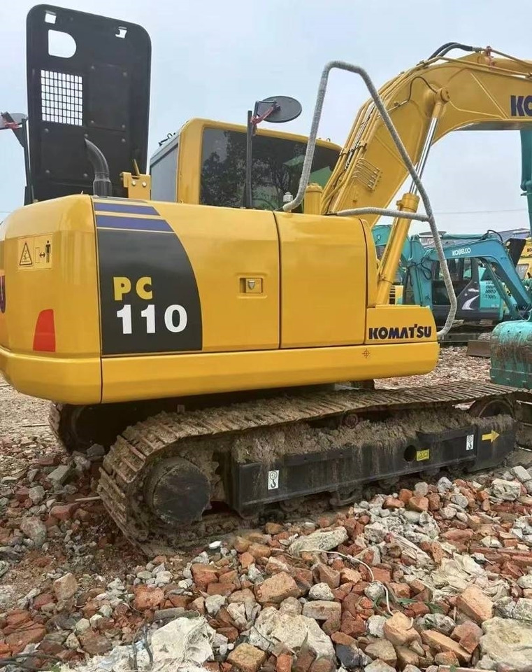 Komatsu PC 110 - Telakaivukone: kuva Komatsu PC 110 - Telakaivukone Komatsu PC 110 - Telakaivukone: kuva Komatsu PC 110 - Telakaivukone