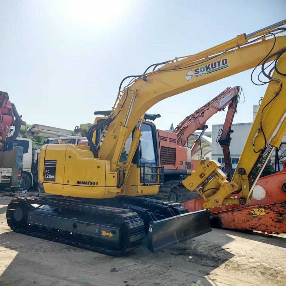 Komatsu PC 128 US - Minikuormaaja: kuva Komatsu PC 128 US - Minikuormaaja Komatsu PC 128 US - Minikuormaaja: kuva Komatsu PC 128 US - Minikuormaaja