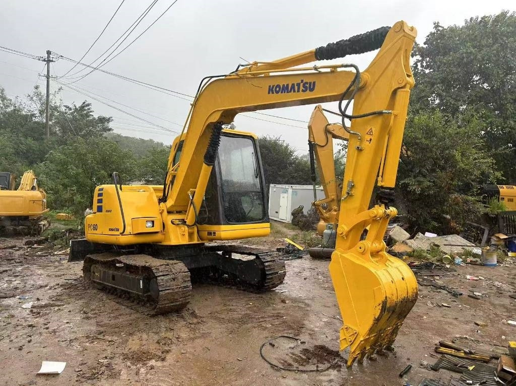 Komatsu PC 60 - Minikuormaaja: kuva Komatsu PC 60 - Minikuormaaja Komatsu PC 60 - Minikuormaaja: kuva Komatsu PC 60 - Minikuormaaja