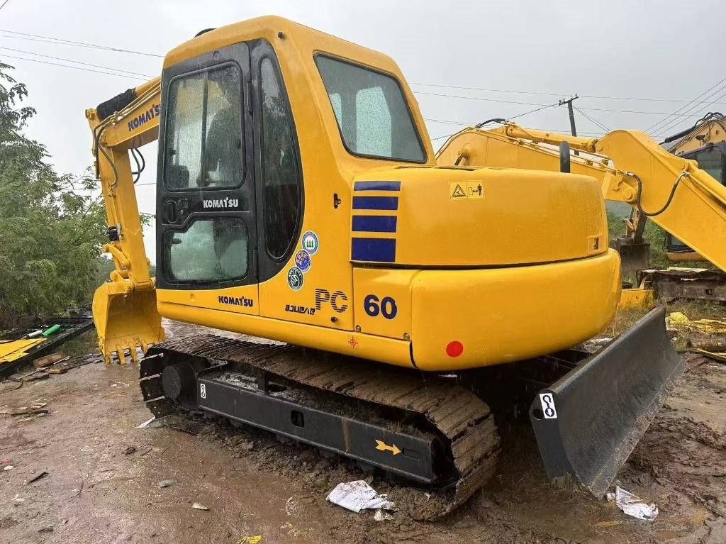 Komatsu PC 60 - Minikuormaaja: kuva Komatsu PC 60 - Minikuormaaja Komatsu PC 60 - Minikuormaaja: kuva Komatsu PC 60 - Minikuormaaja