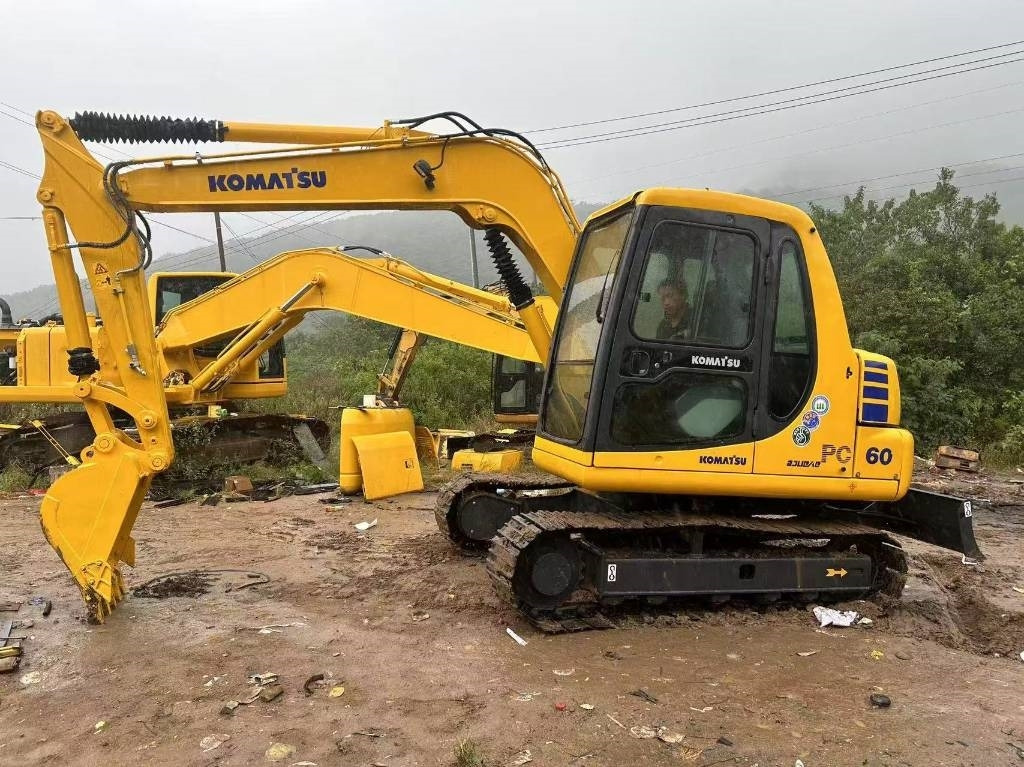 Komatsu PC 60 - Minikuormaaja: kuva Komatsu PC 60 - Minikuormaaja Komatsu PC 60 - Minikuormaaja: kuva Komatsu PC 60 - Minikuormaaja