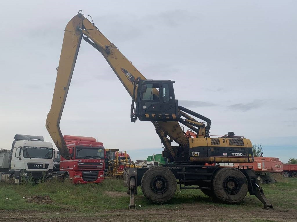 CAT M 325 C L MH - Materiaalinkäsittelykone: kuva CAT M 325 C L MH - Materiaalinkäsittelykone CAT M 325 C L MH - Materiaalinkäsittelykone: kuva CAT M 325 C L MH - Materiaalinkäsittelykone