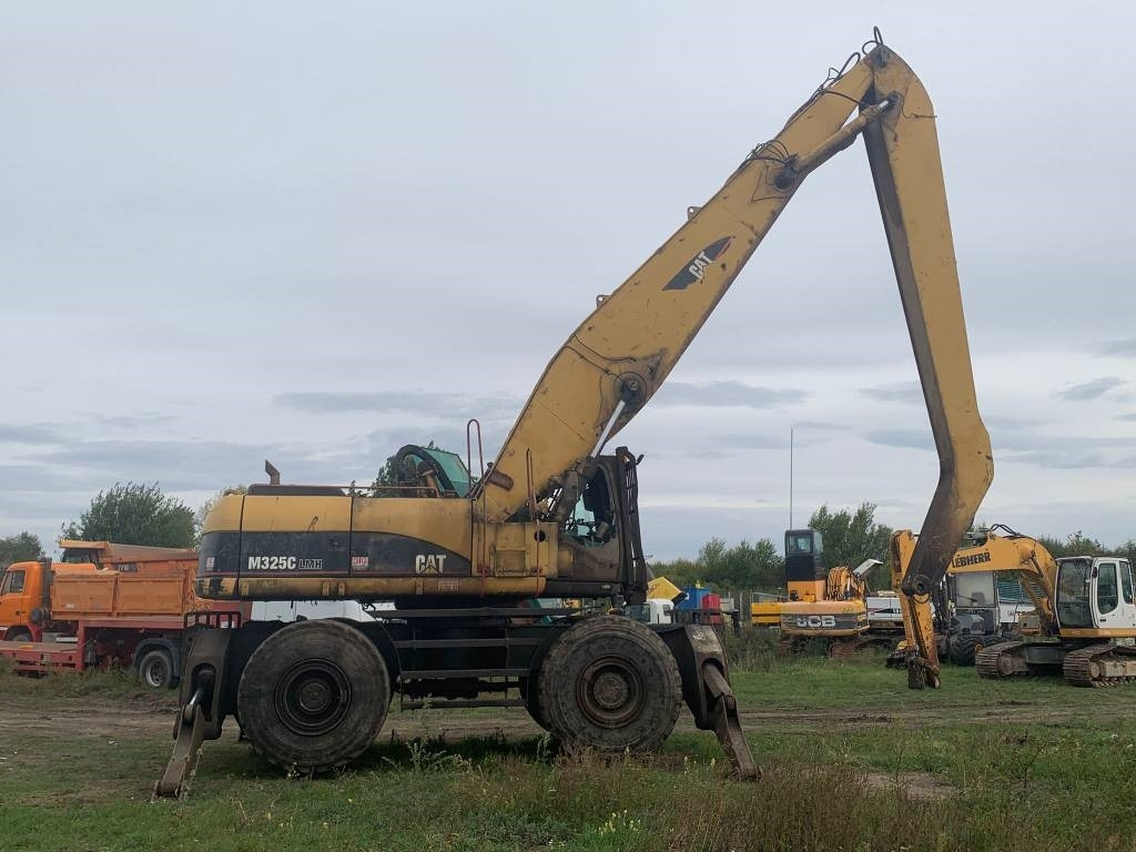 CAT M 325 C L MH - Materiaalinkäsittelykone: kuva CAT M 325 C L MH - Materiaalinkäsittelykone CAT M 325 C L MH - Materiaalinkäsittelykone: kuva CAT M 325 C L MH - Materiaalinkäsittelykone