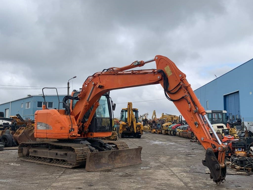 Doosan DX 140 LCR - Telakaivukone: kuva Doosan DX 140 LCR - Telakaivukone Doosan DX 140 LCR - Telakaivukone: kuva Doosan DX 140 LCR - Telakaivukone
