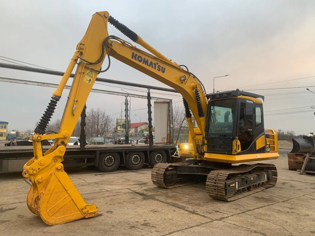 Komatsu PC 130 - Telakaivukone: kuva Komatsu PC 130 - Telakaivukone Komatsu PC 130 - Telakaivukone: kuva Komatsu PC 130 - Telakaivukone