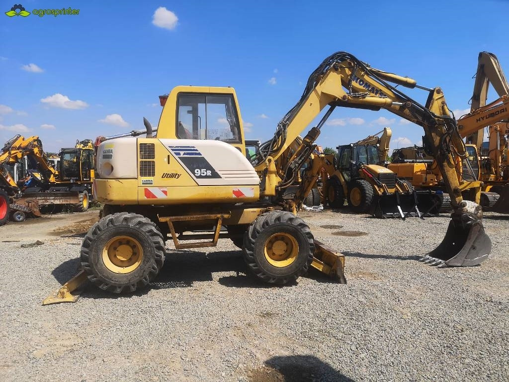 Komatsu PW 95 - Minikuormaaja: kuva Komatsu PW 95 - Minikuormaaja Komatsu PW 95 - Minikuormaaja: kuva Komatsu PW 95 - Minikuormaaja