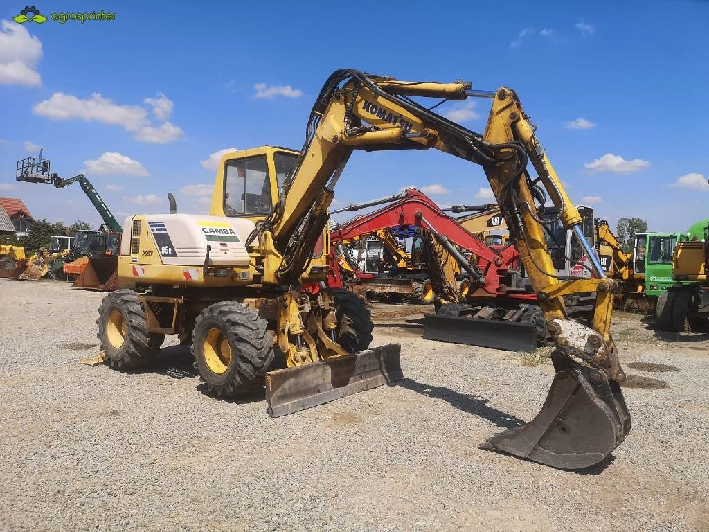 Komatsu PW 95 - Minikuormaaja: kuva Komatsu PW 95 - Minikuormaaja Komatsu PW 95 - Minikuormaaja: kuva Komatsu PW 95 - Minikuormaaja