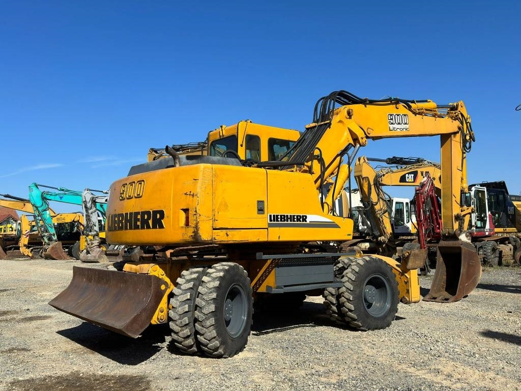 Liebherr A 900 B - Pyöräalustainen kaivinkone: kuva Liebherr A 900 B - Pyöräalustainen kaivinkone Liebherr A 900 B - Pyöräalustainen kaivinkone: kuva Liebherr A 900 B - Pyöräalustainen kaivinkone