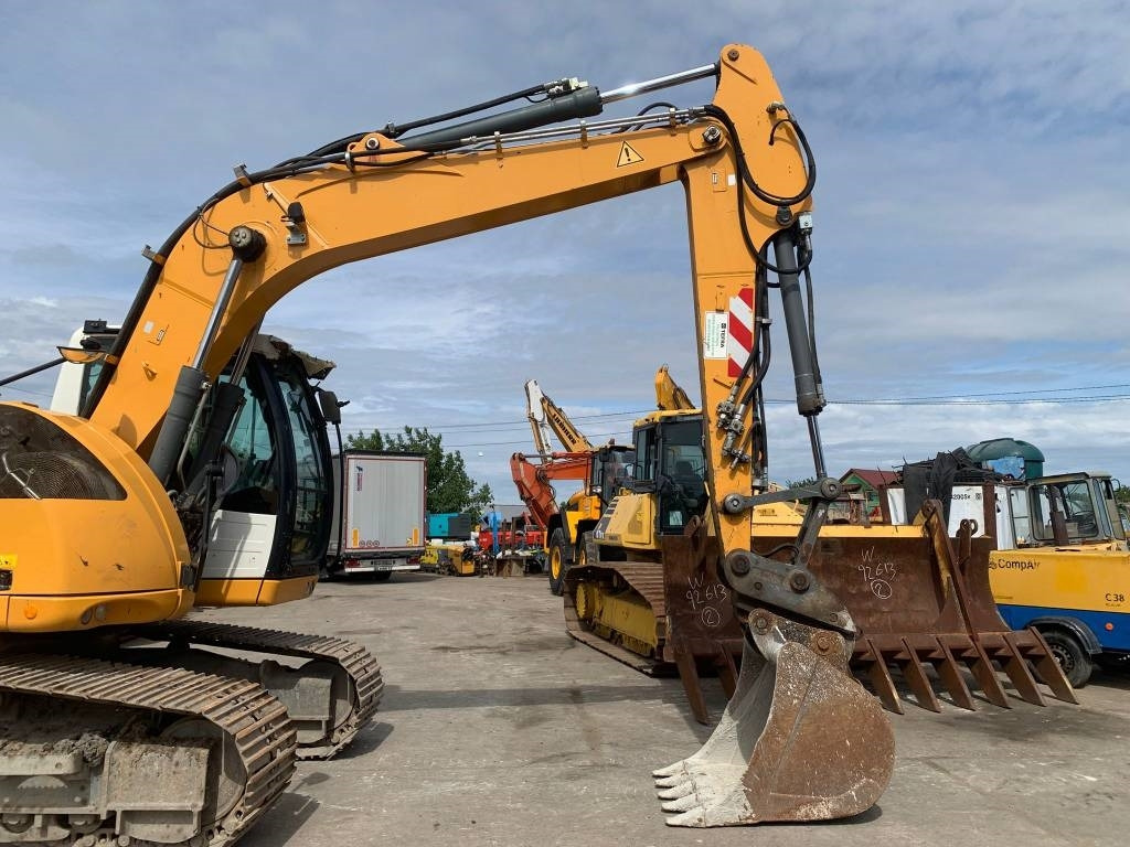 Liebherr R 914 Compact Litronic - Pyöräalustainen kaivinkone: kuva Liebherr R 914 Compact Litronic - Pyöräalustainen kaivinkone Liebherr R 914 Compact Litronic - Pyöräalustainen kaivinkone: kuva Liebherr R 914 Compact Litronic - Pyöräalustainen kaivinkone