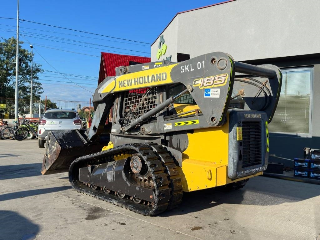 New Holland C 185 - Liukuohjattu telakuormaaja: kuva New Holland C 185 - Liukuohjattu telakuormaaja New Holland C 185 - Liukuohjattu telakuormaaja: kuva New Holland C 185 - Liukuohjattu telakuormaaja