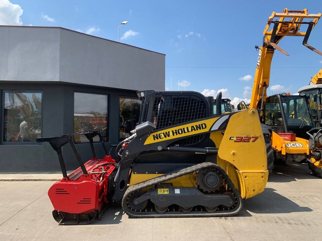 New Holland C327 - Liukuohjattu kuormaaja: kuva New Holland C327 - Liukuohjattu kuormaaja New Holland C327 - Liukuohjattu kuormaaja: kuva New Holland C327 - Liukuohjattu kuormaaja