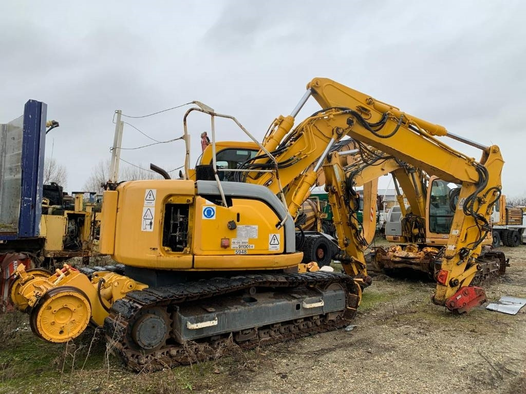 New Holland E 135 SR-1ES RAILWAY - Telakaivukone: kuva New Holland E 135 SR-1ES RAILWAY - Telakaivukone New Holland E 135 SR-1ES RAILWAY - Telakaivukone: kuva New Holland E 135 SR-1ES RAILWAY - Telakaivukone