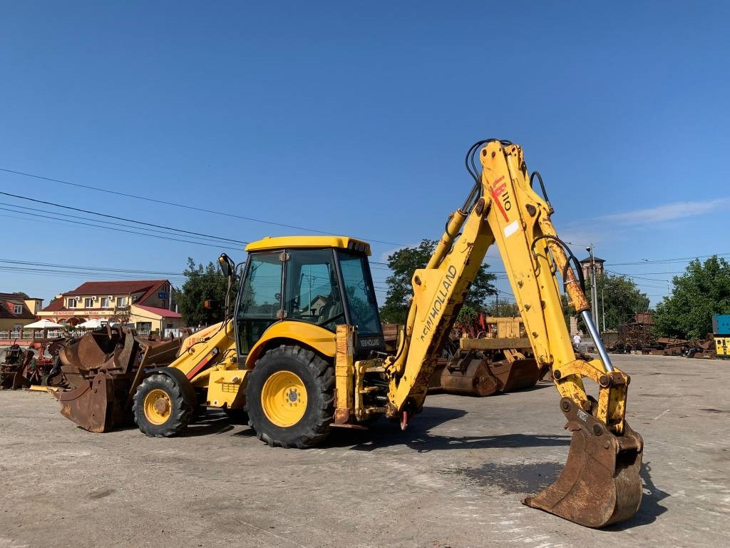 New Holland LB 110-4 PT - Kaivuri-trukki: kuva New Holland LB 110-4 PT - Kaivuri-trukki New Holland LB 110-4 PT - Kaivuri-trukki: kuva New Holland LB 110-4 PT - Kaivuri-trukki