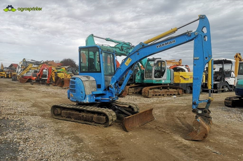 Yanmar Vio 57 - Minikuormaaja: kuva Yanmar Vio 57 - Minikuormaaja Yanmar Vio 57 - Minikuormaaja: kuva Yanmar Vio 57 - Minikuormaaja