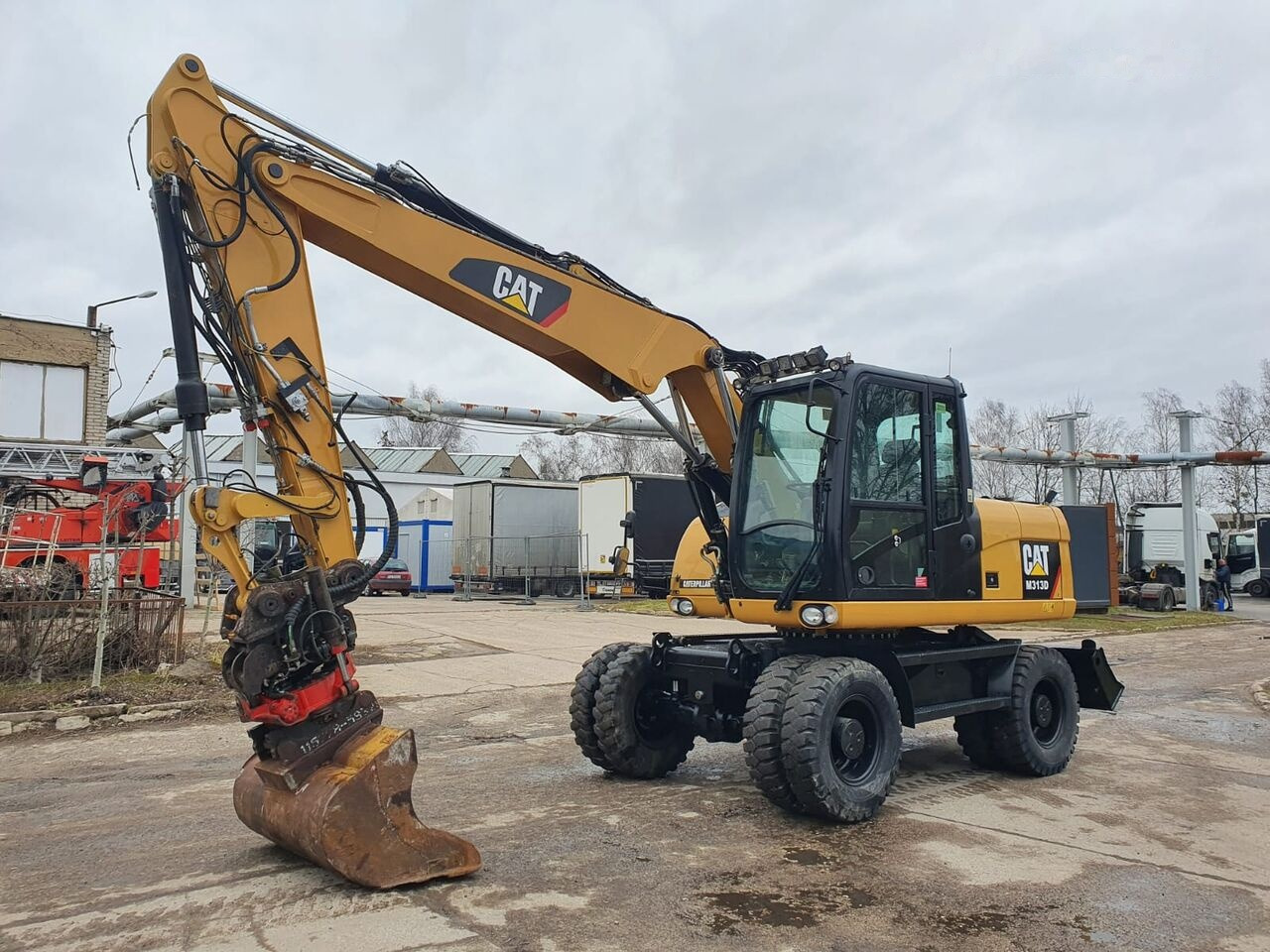 Caterpillar M 313 D Tiltrotator - Pyöräalustainen kaivinkone: kuva Caterpillar M 313 D Tiltrotator - Pyöräalustainen kaivinkone Caterpillar M 313 D Tiltrotator - Pyöräalustainen kaivinkone: kuva Caterpillar M 313 D Tiltrotator - Pyöräalustainen kaivinkone
