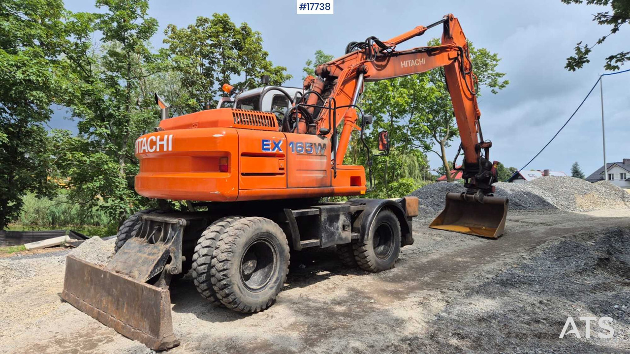HITACHI EW 165W (2000) ROTOTILT Wheel Excavator - Pyöräalustainen kaivinkone: kuva HITACHI EW 165W (2000) ROTOTILT Wheel Excavator - Pyöräalustainen kaivinkone HITACHI EW 165W (2000) ROTOTILT Wheel Excavator - Pyöräalustainen kaivinkone: kuva HITACHI EW 165W (2000) ROTOTILT Wheel Excavator - Pyöräalustainen kaivinkone