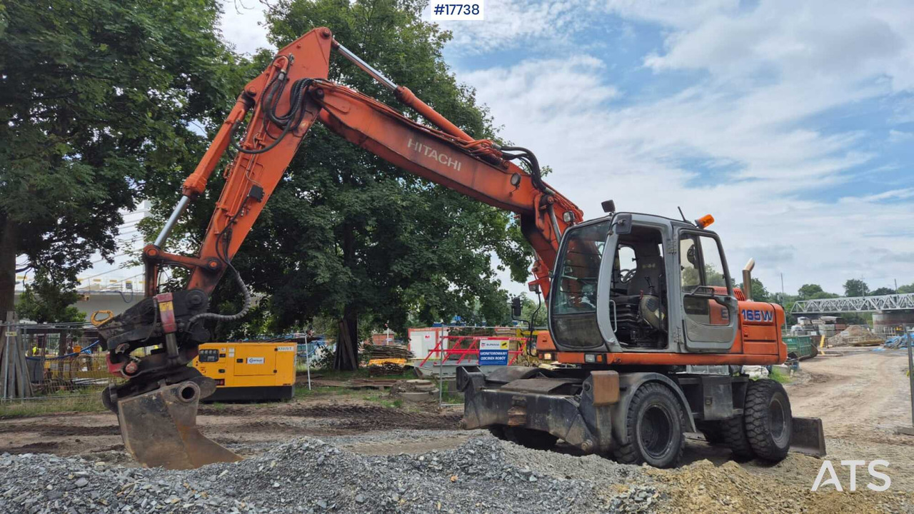 HITACHI EW 165W (2000) ROTOTILT Wheel Excavator - Pyöräalustainen kaivinkone: kuva HITACHI EW 165W (2000) ROTOTILT Wheel Excavator - Pyöräalustainen kaivinkone HITACHI EW 165W (2000) ROTOTILT Wheel Excavator - Pyöräalustainen kaivinkone: kuva HITACHI EW 165W (2000) ROTOTILT Wheel Excavator - Pyöräalustainen kaivinkone