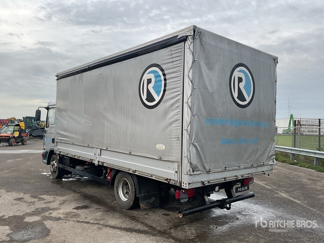 2007 MAN TGL12.210 4x2 Curtain Side Truck - Pressukapelli kuorma-auto: kuva 2007 MAN TGL12.210 4x2 Curtain Side Truck - Pressukapelli kuorma-auto 2007 MAN TGL12.210 4x2 Curtain Side Truck - Pressukapelli kuorma-auto: kuva 2007 MAN TGL12.210 4x2 Curtain Side Truck - Pressukapelli kuorma-auto
