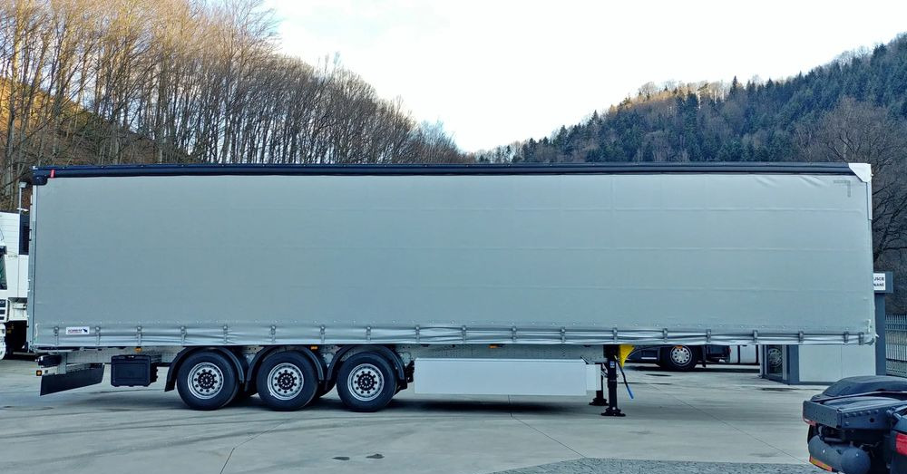 Schmitz Cargobull VARIOS + 24 PAL KOSZ - Pressukapellipuoliperävaunu: kuva  Schmitz Cargobull VARIOS + 24 PAL KOSZ - Pressukapellipuoliperävaunu Schmitz Cargobull VARIOS + 24 PAL KOSZ - Pressukapellipuoliperävaunu: kuva  Schmitz Cargobull VARIOS + 24 PAL KOSZ - Pressukapellipuoliperävaunu