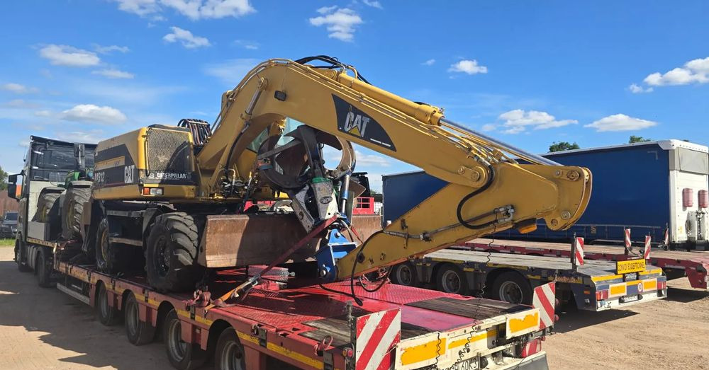 Caterpillar M312 - Pyöräalustainen kaivinkone: kuva Caterpillar M312 - Pyöräalustainen kaivinkone Caterpillar M312 - Pyöräalustainen kaivinkone: kuva Caterpillar M312 - Pyöräalustainen kaivinkone