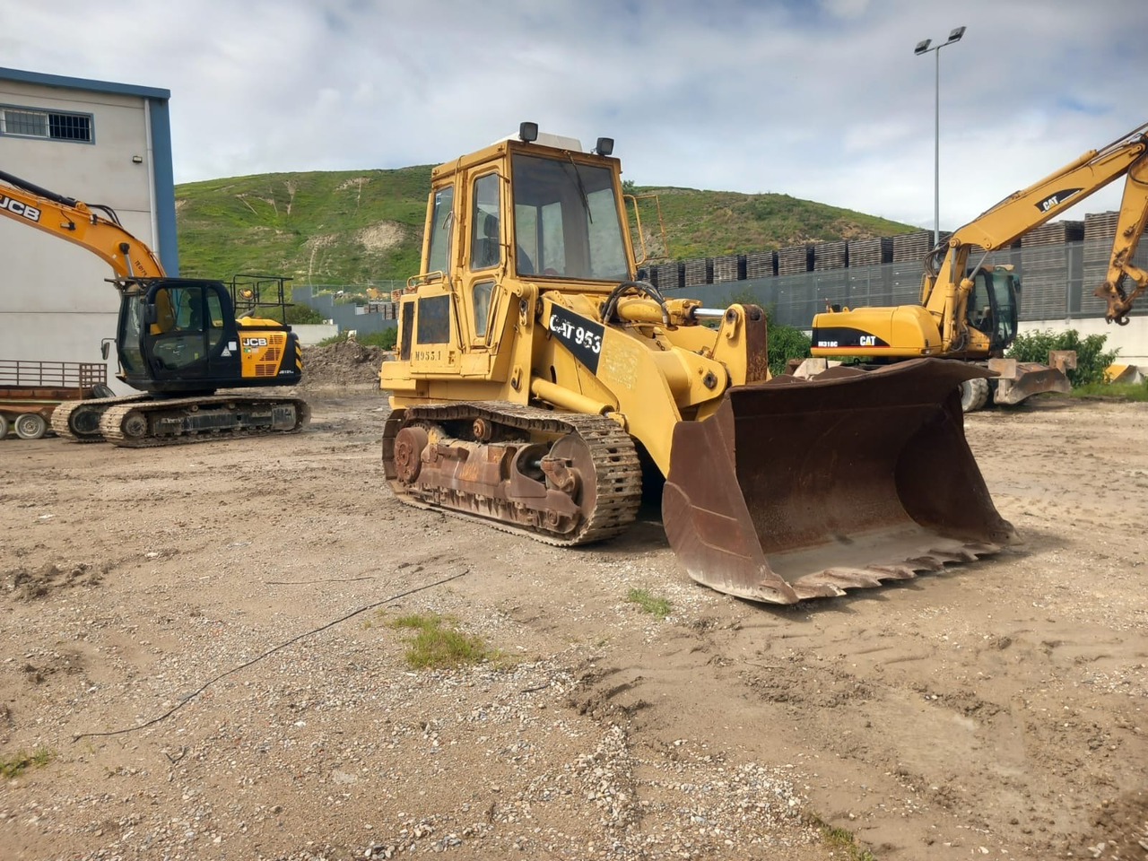 CATERPILLAR 953 - Rakennuskoneet: kuva CATERPILLAR 953 - Rakennuskoneet CATERPILLAR 953 - Rakennuskoneet: kuva CATERPILLAR 953 - Rakennuskoneet