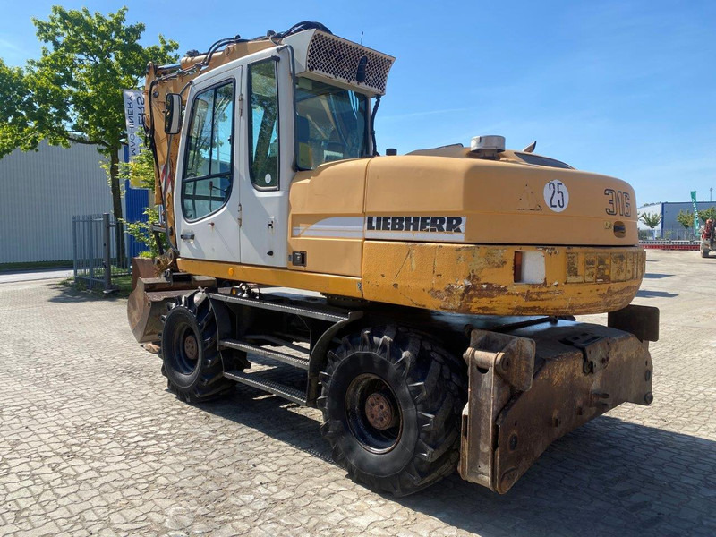 Liebherr A316 Litronic A 316 litronic - Pyöräalustainen kaivinkone: kuva Liebherr A316 Litronic A 316 litronic - Pyöräalustainen kaivinkone Liebherr A316 Litronic A 316 litronic - Pyöräalustainen kaivinkone: kuva Liebherr A316 Litronic A 316 litronic - Pyöräalustainen kaivinkone