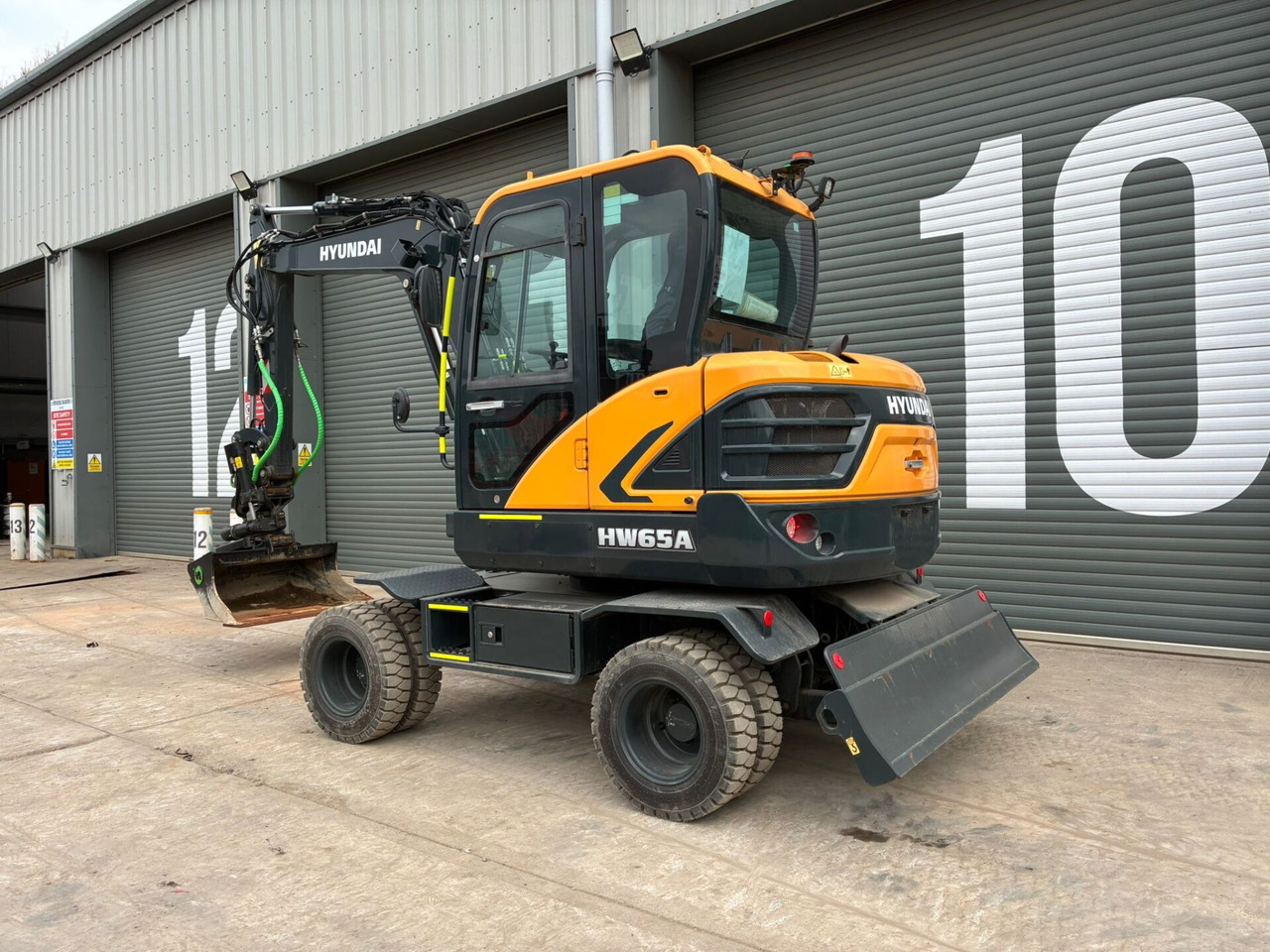 Hyundai HW65AH Ex Demo - Pyöräalustainen kaivinkone: kuva Hyundai HW65AH Ex Demo - Pyöräalustainen kaivinkone Hyundai HW65AH Ex Demo - Pyöräalustainen kaivinkone: kuva Hyundai HW65AH Ex Demo - Pyöräalustainen kaivinkone