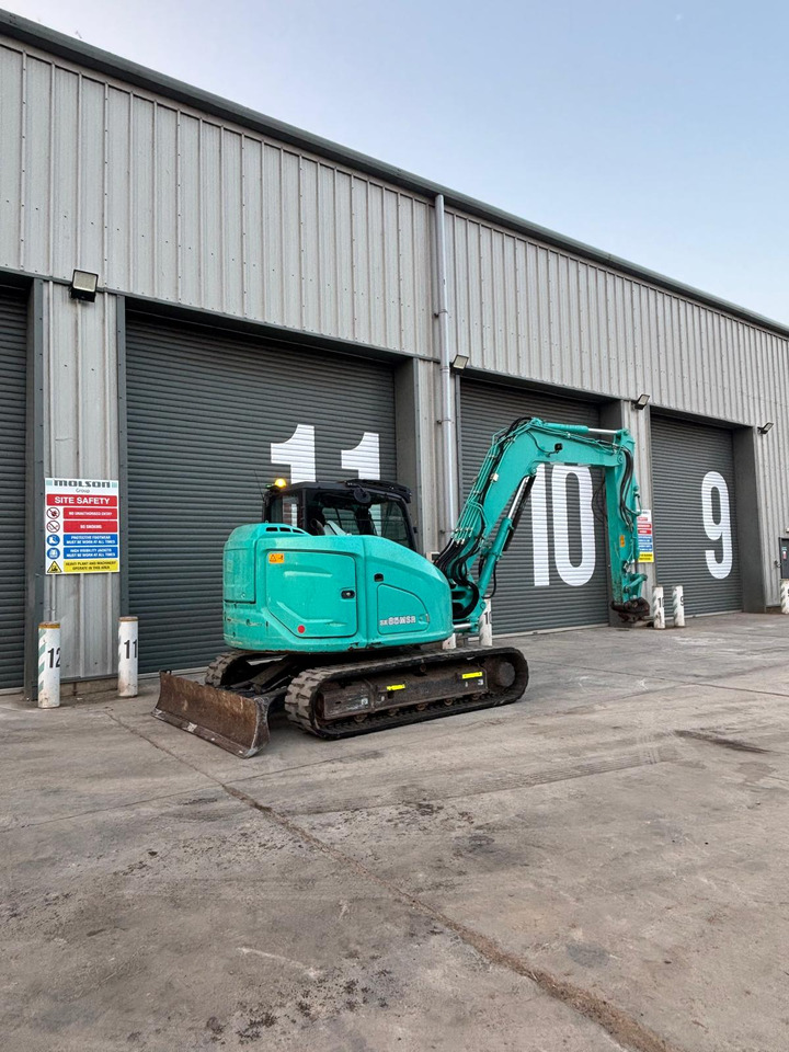 Kobelco SK85MSR-7 - Minikuormaaja: kuva Kobelco SK85MSR-7 - Minikuormaaja Kobelco SK85MSR-7 - Minikuormaaja: kuva Kobelco SK85MSR-7 - Minikuormaaja