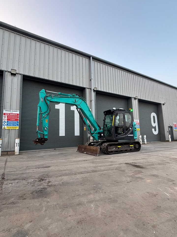 Kobelco SK85MSR-7 - Minikuormaaja: kuva Kobelco SK85MSR-7 - Minikuormaaja Kobelco SK85MSR-7 - Minikuormaaja: kuva Kobelco SK85MSR-7 - Minikuormaaja