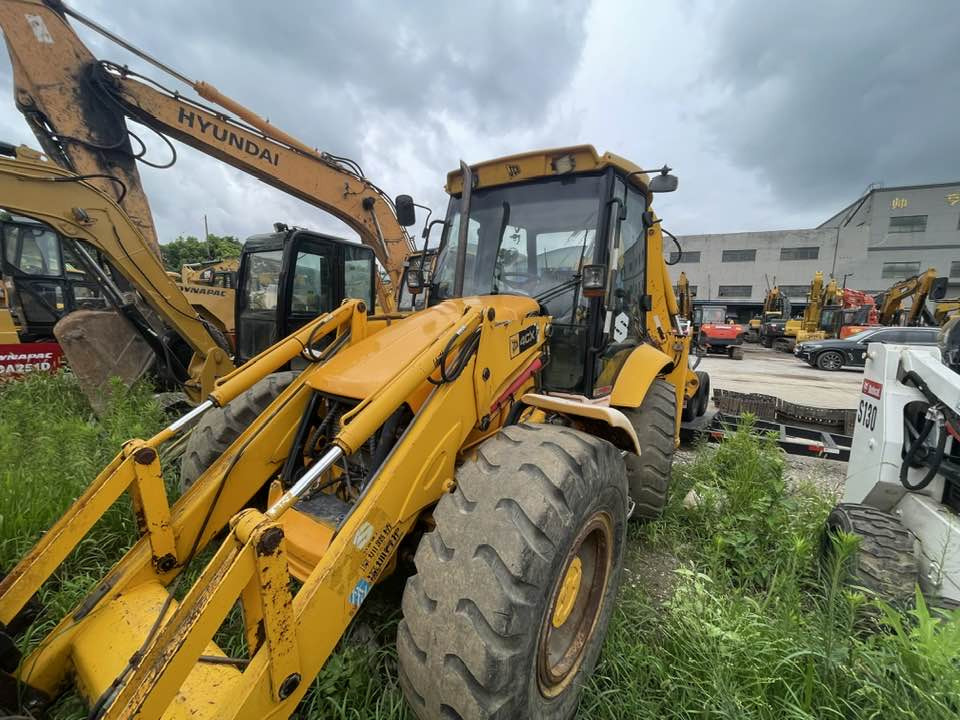JCB 4CX Backhoe Loader - Kaivuri-trukki: kuva JCB 4CX Backhoe Loader - Kaivuri-trukki JCB 4CX Backhoe Loader - Kaivuri-trukki: kuva JCB 4CX Backhoe Loader - Kaivuri-trukki