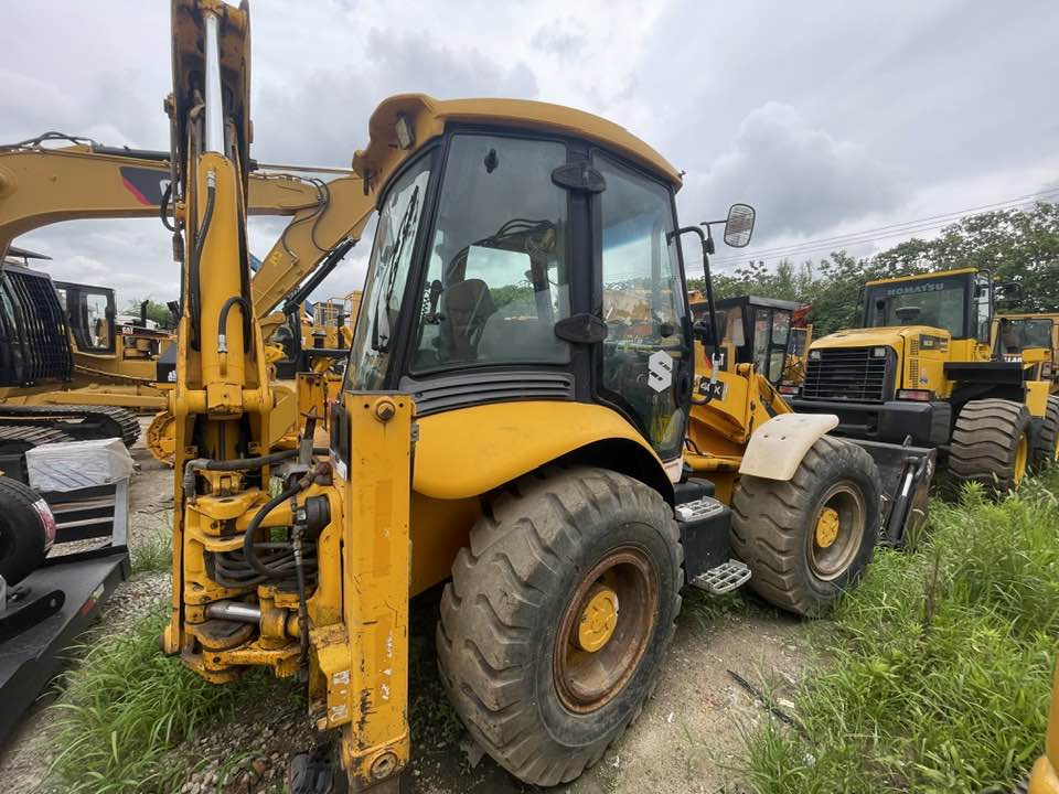 JCB 4CX Backhoe Loader - Kaivuri-trukki: kuva JCB 4CX Backhoe Loader - Kaivuri-trukki JCB 4CX Backhoe Loader - Kaivuri-trukki: kuva JCB 4CX Backhoe Loader - Kaivuri-trukki