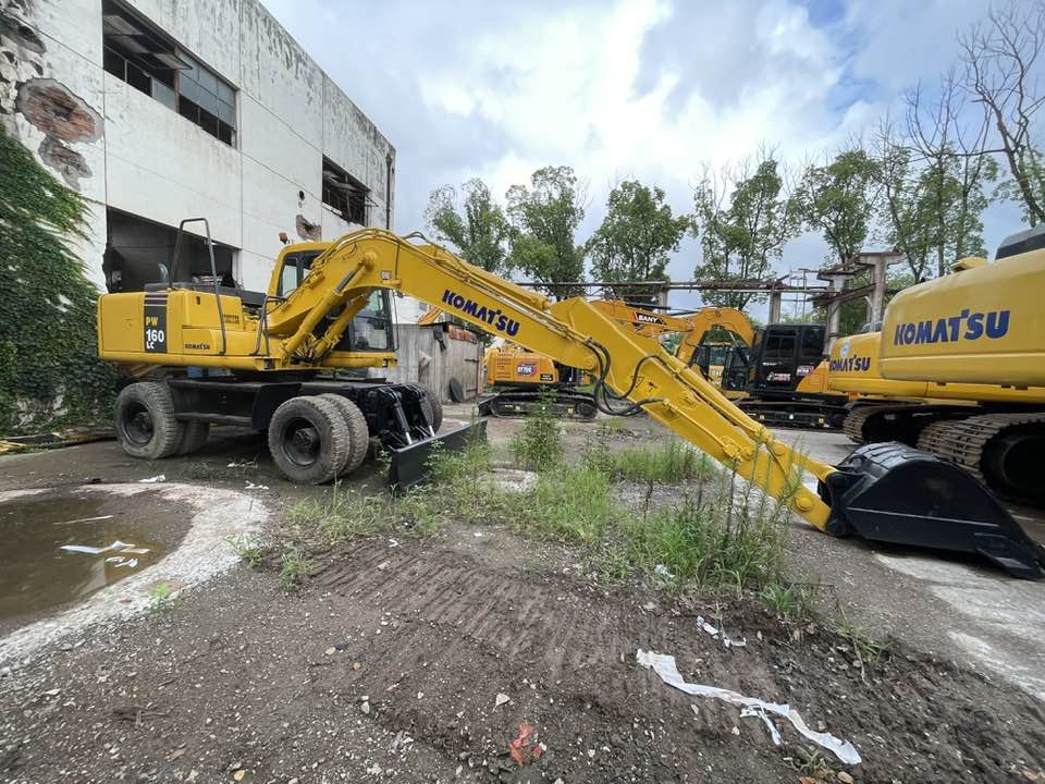 Komatsu PW160 - Pyöräalustainen kaivinkone: kuva Komatsu PW160 - Pyöräalustainen kaivinkone Komatsu PW160 - Pyöräalustainen kaivinkone: kuva Komatsu PW160 - Pyöräalustainen kaivinkone