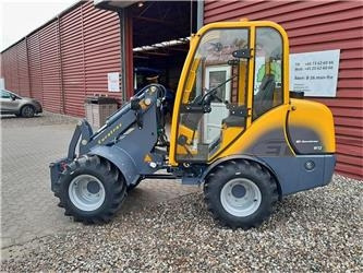 Eurotrac W12S med førerhus, skovl og gafler - Pyöräkuormaaja: kuva Eurotrac W12S med førerhus, skovl og gafler - Pyöräkuormaaja Eurotrac W12S med førerhus, skovl og gafler - Pyöräkuormaaja: kuva Eurotrac W12S med førerhus, skovl og gafler - Pyöräkuormaaja