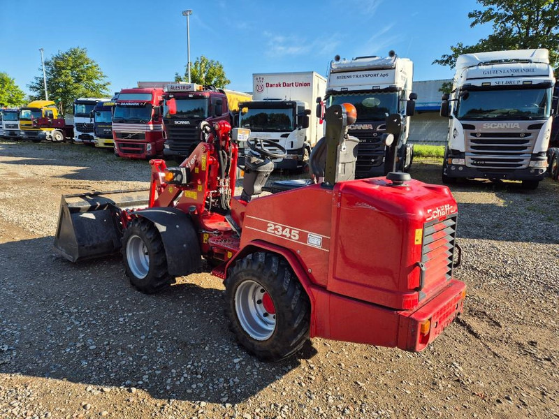 Schäffer 2345 (Bucket/Forks) - Liukuohjattu telakuormaaja: kuva Schäffer 2345 (Bucket/Forks) - Liukuohjattu telakuormaaja Schäffer 2345 (Bucket/Forks) - Liukuohjattu telakuormaaja: kuva Schäffer 2345 (Bucket/Forks) - Liukuohjattu telakuormaaja