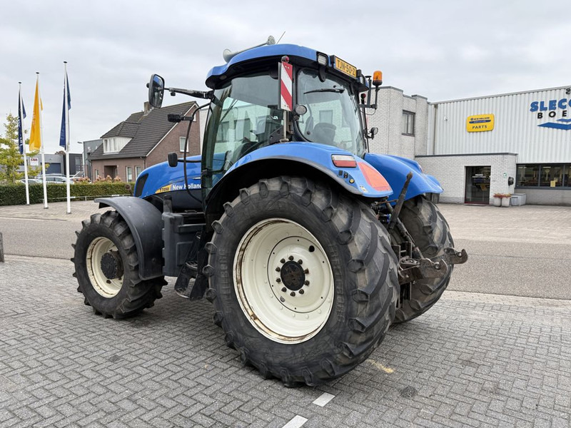 New Holland T7050 Power Command - Traktori: kuva New Holland T7050 Power Command - Traktori New Holland T7050 Power Command - Traktori: kuva New Holland T7050 Power Command - Traktori