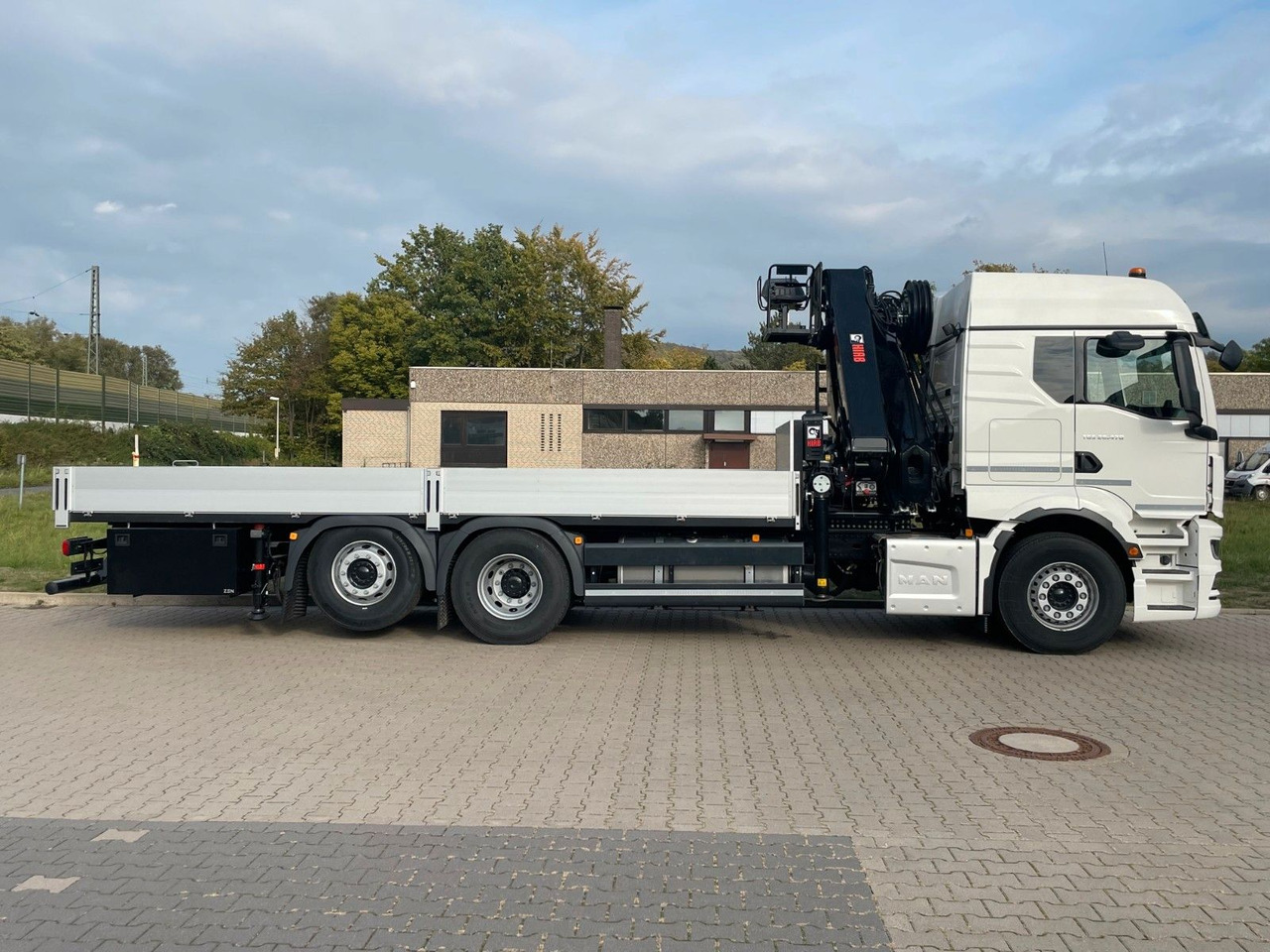 Nosturiauto MAN TGS 26.480 /6X Hiab X-HIRRO 302 E-6 JIB 70x4: kuva Nosturiauto MAN TGS 26.480 /6X Hiab X-HIRRO 302 E-6 JIB 70x4