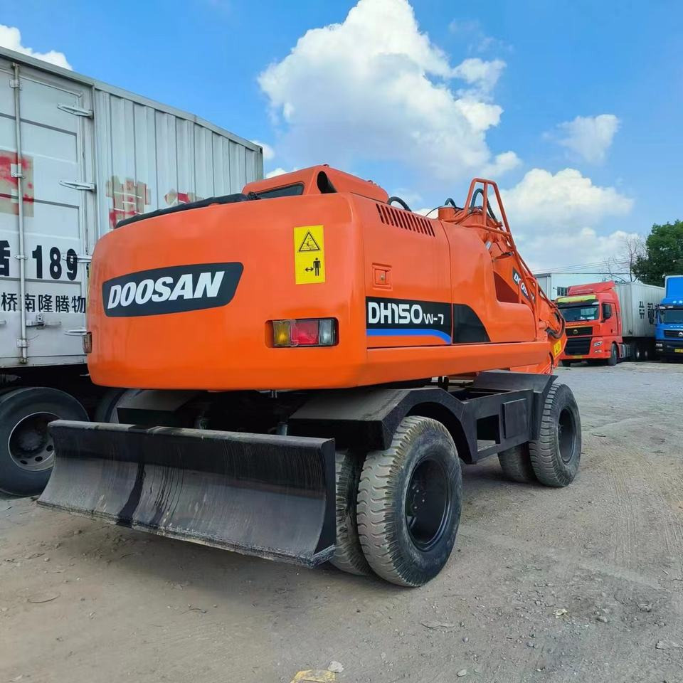 Doosan DH 150 LC-7 - Pyöräalustainen kaivinkone: kuva Doosan DH 150 LC-7 - Pyöräalustainen kaivinkone Doosan DH 150 LC-7 - Pyöräalustainen kaivinkone: kuva Doosan DH 150 LC-7 - Pyöräalustainen kaivinkone
