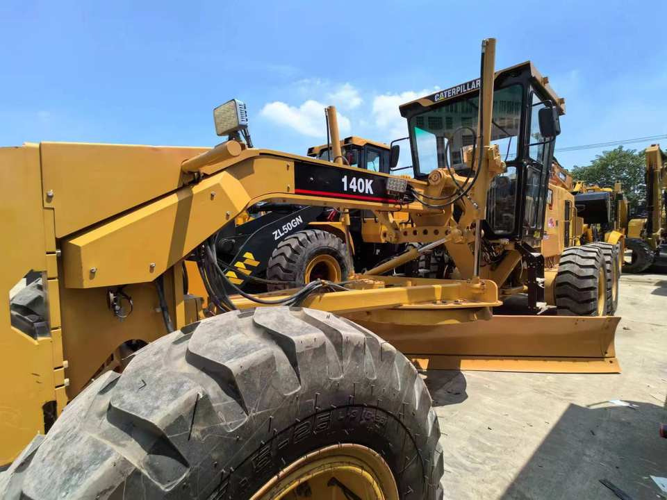 Second Hand Used Construction Machinery CAT 140K 15 Ton Grader for Sale 1000H From Shanghai Japanese Brand Good Condition - Tiehöylä: kuva Second Hand Used Construction Machinery CAT 140K 15 Ton Grader for Sale 1000H From Shanghai Japanese Brand Good Condition - Tiehöylä Second Hand Used Construction Machinery CAT 140K 15 Ton Grader for Sale 1000H From Shanghai Japanese Brand Good Condition - Tiehöylä: kuva Second Hand Used Construction Machinery CAT 140K 15 Ton Grader for Sale 1000H From Shanghai Japanese Brand Good Condition - Tiehöylä