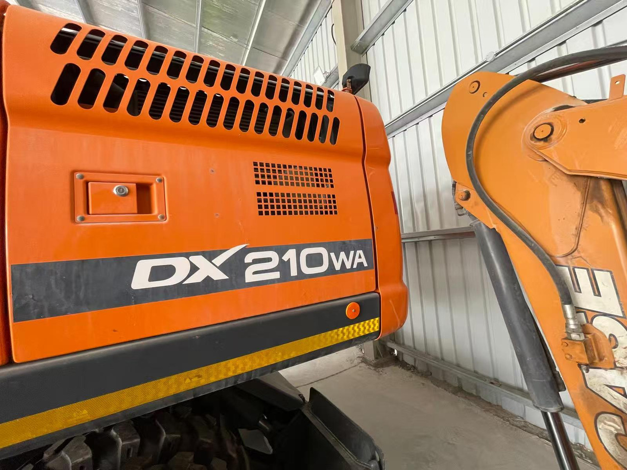 DOOSAN DX210 - Pyöräalustainen kaivinkone: kuva DOOSAN DX210 - Pyöräalustainen kaivinkone DOOSAN DX210 - Pyöräalustainen kaivinkone: kuva DOOSAN DX210 - Pyöräalustainen kaivinkone