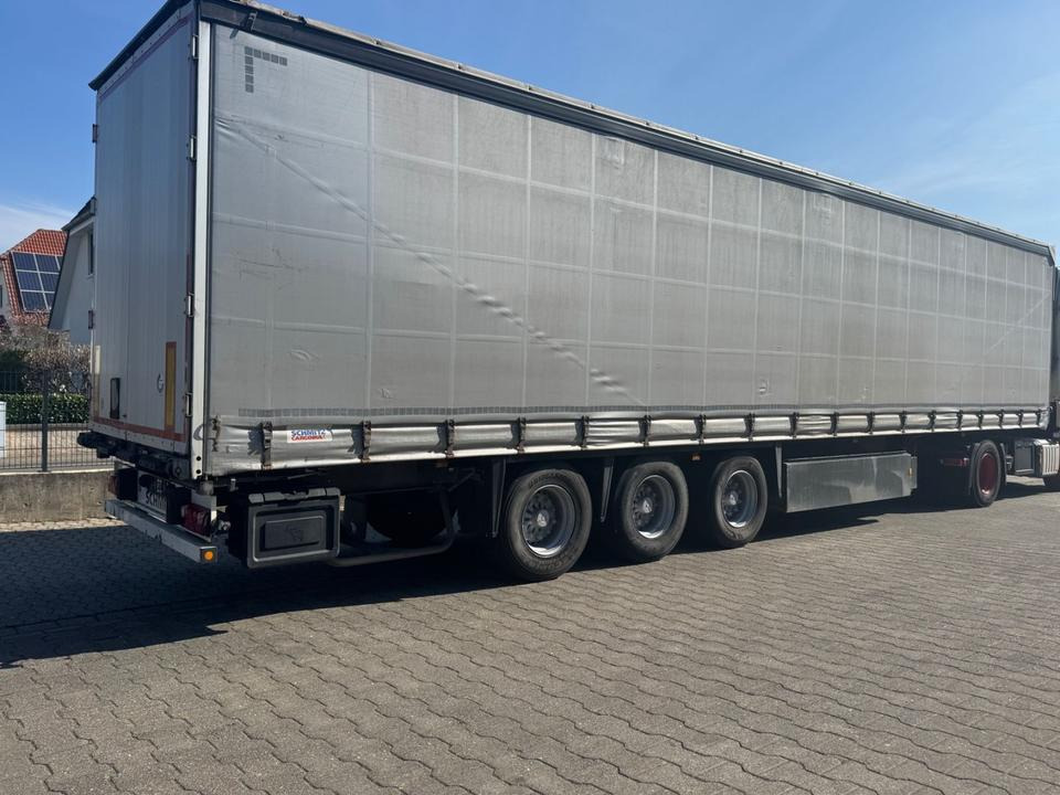 Schmitz Cargobull SCS 24-L/Zertifiziert/Lift/Top-Zustand! - Pressukapellipuoliperävaunu: kuva Schmitz Cargobull SCS 24-L/Zertifiziert/Lift/Top-Zustand! - Pressukapellipuoliperävaunu Schmitz Cargobull SCS 24-L/Zertifiziert/Lift/Top-Zustand! - Pressukapellipuoliperävaunu: kuva Schmitz Cargobull SCS 24-L/Zertifiziert/Lift/Top-Zustand! - Pressukapellipuoliperävaunu