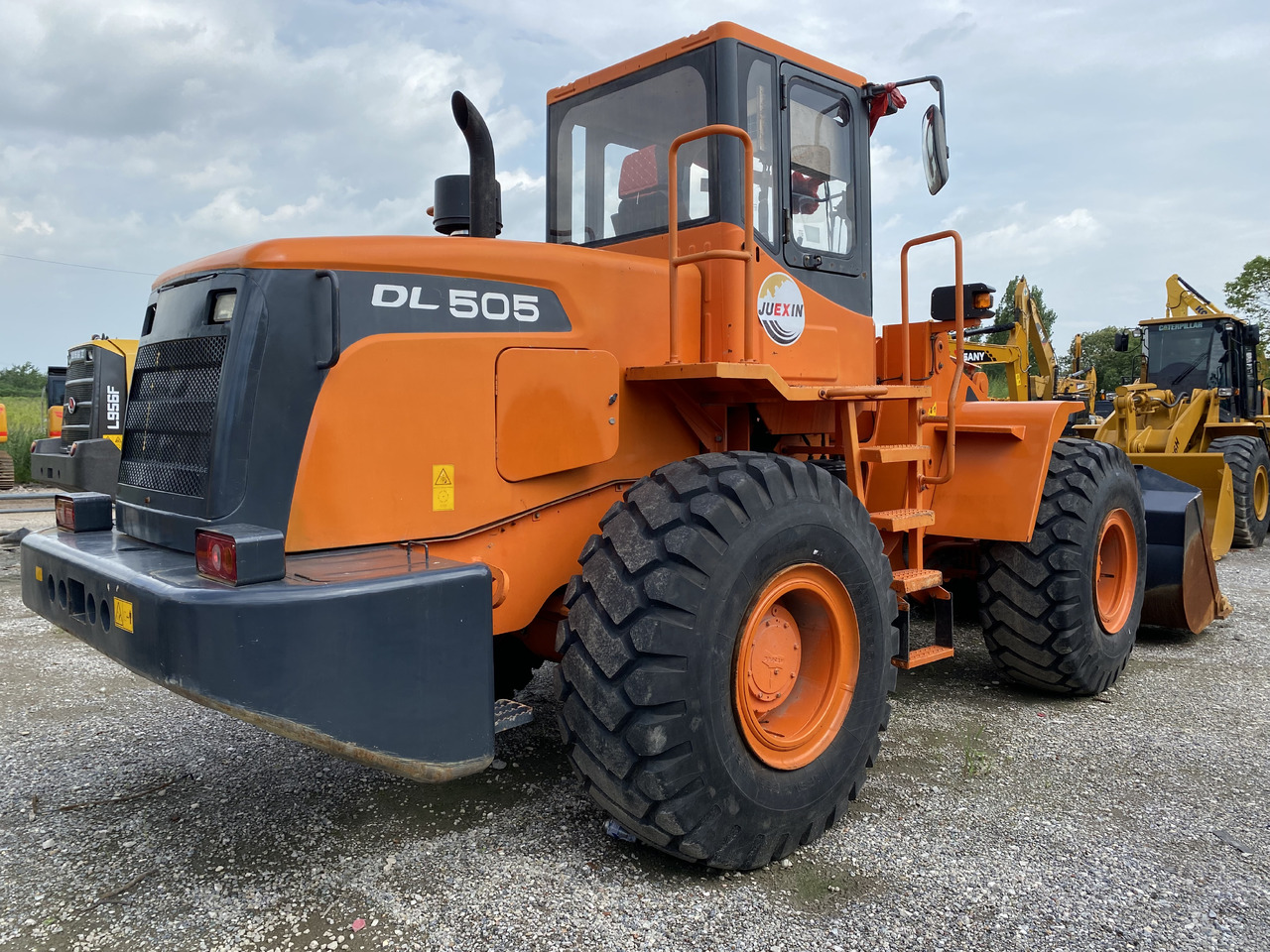 DOOSAN DL505 - Pyöräkuormaaja: kuva DOOSAN DL505 - Pyöräkuormaaja DOOSAN DL505 - Pyöräkuormaaja: kuva DOOSAN DL505 - Pyöräkuormaaja