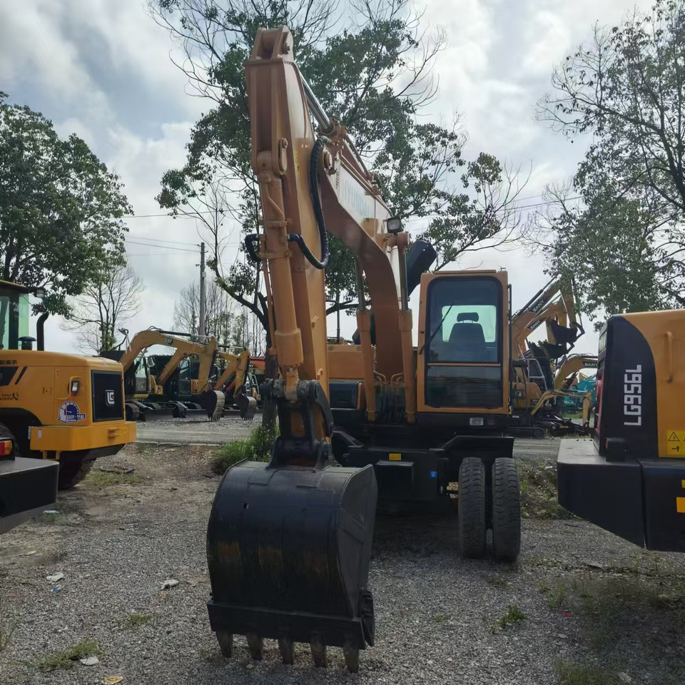 Hyundai R150W-7 - Pyöräalustainen kaivinkone: kuva Hyundai R150W-7 - Pyöräalustainen kaivinkone Hyundai R150W-7 - Pyöräalustainen kaivinkone: kuva Hyundai R150W-7 - Pyöräalustainen kaivinkone