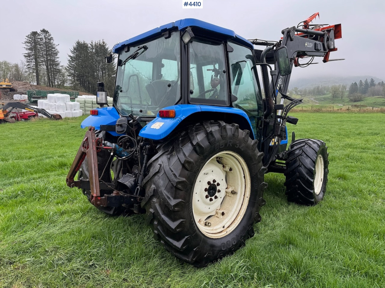 2006 New Holland TL100 A w/Front Loader. - Traktori: kuva 2006 New Holland TL100 A w/Front Loader. - Traktori 2006 New Holland TL100 A w/Front Loader. - Traktori: kuva 2006 New Holland TL100 A w/Front Loader. - Traktori