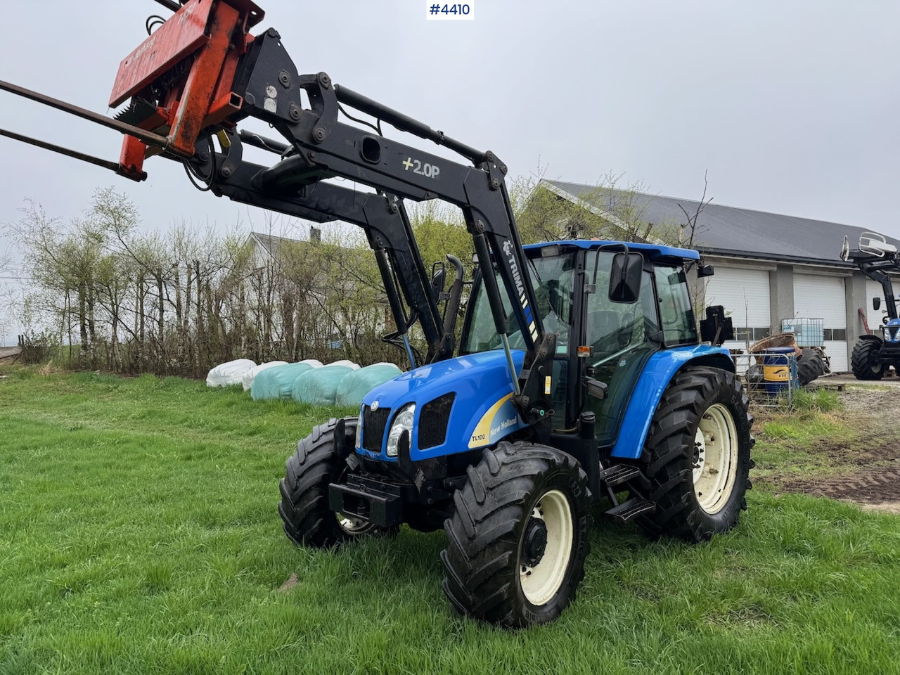 2006 New Holland TL100 A w/Front Loader. - Traktori: kuva 2006 New Holland TL100 A w/Front Loader. - Traktori 2006 New Holland TL100 A w/Front Loader. - Traktori: kuva 2006 New Holland TL100 A w/Front Loader. - Traktori