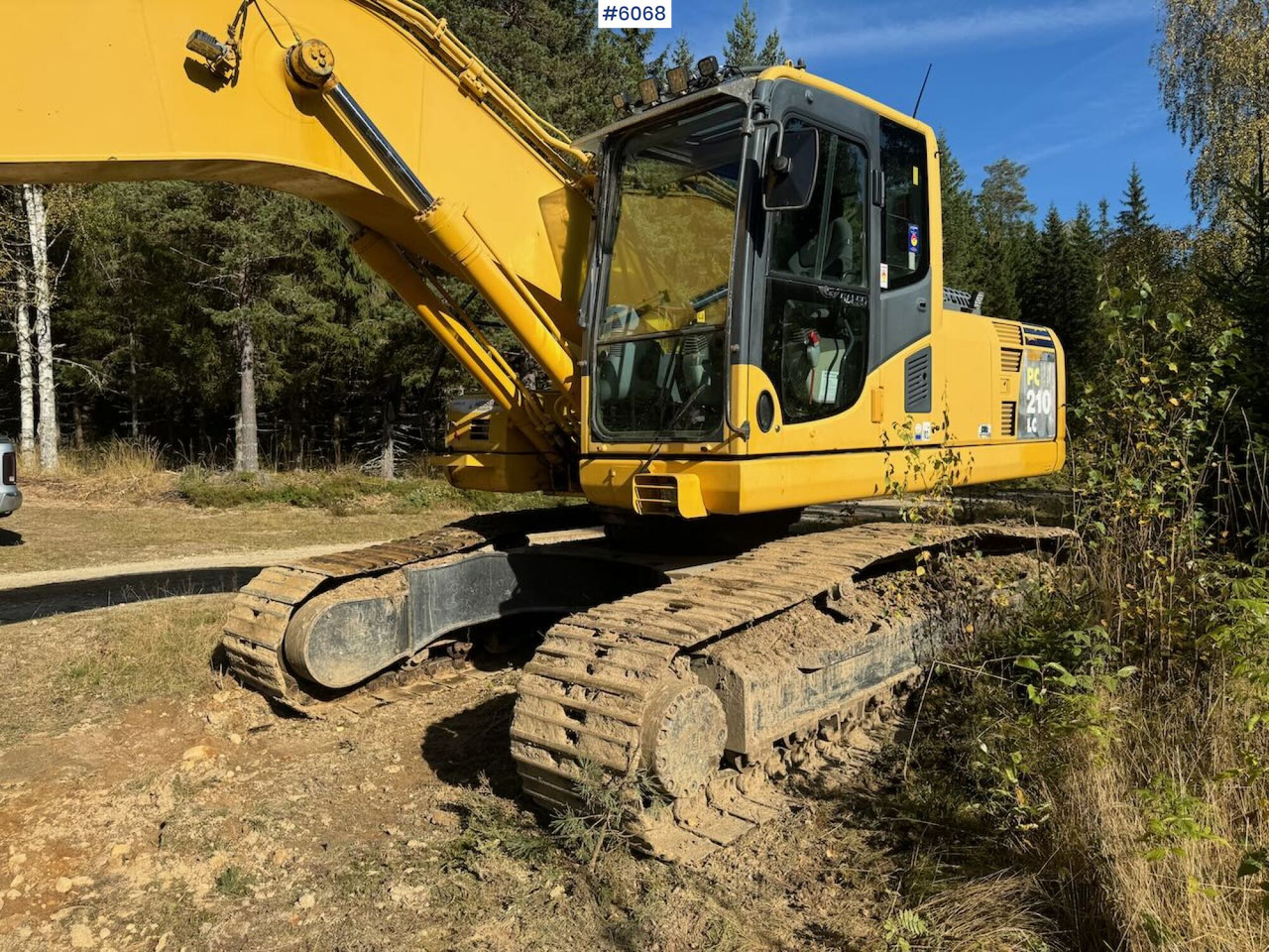 2007 Komatsu PC210LC Tracked Excavator with 3 buckets, tilt, grapple, and ripper. - Kaivuri: kuva 2007 Komatsu PC210LC Tracked Excavator with 3 buckets, tilt, grapple, and ripper. - Kaivuri 2007 Komatsu PC210LC Tracked Excavator with 3 buckets, tilt, grapple, and ripper. - Kaivuri: kuva 2007 Komatsu PC210LC Tracked Excavator with 3 buckets, tilt, grapple, and ripper. - Kaivuri