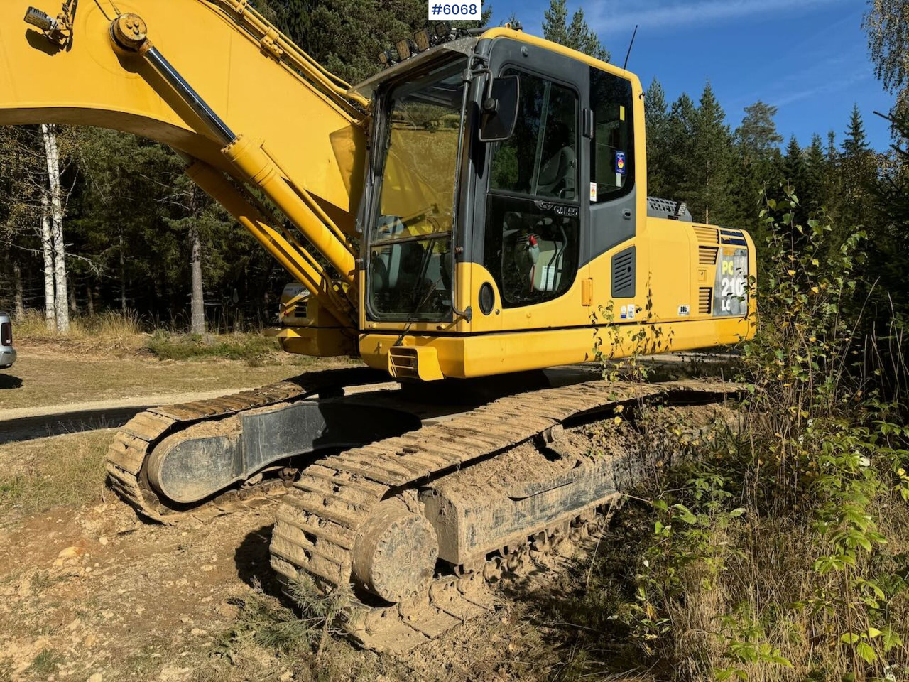 2007 Komatsu PC210LC Tracked Excavator with 3 buckets, tilt, grapple, and ripper. - Kaivuri: kuva 2007 Komatsu PC210LC Tracked Excavator with 3 buckets, tilt, grapple, and ripper. - Kaivuri 2007 Komatsu PC210LC Tracked Excavator with 3 buckets, tilt, grapple, and ripper. - Kaivuri: kuva 2007 Komatsu PC210LC Tracked Excavator with 3 buckets, tilt, grapple, and ripper. - Kaivuri