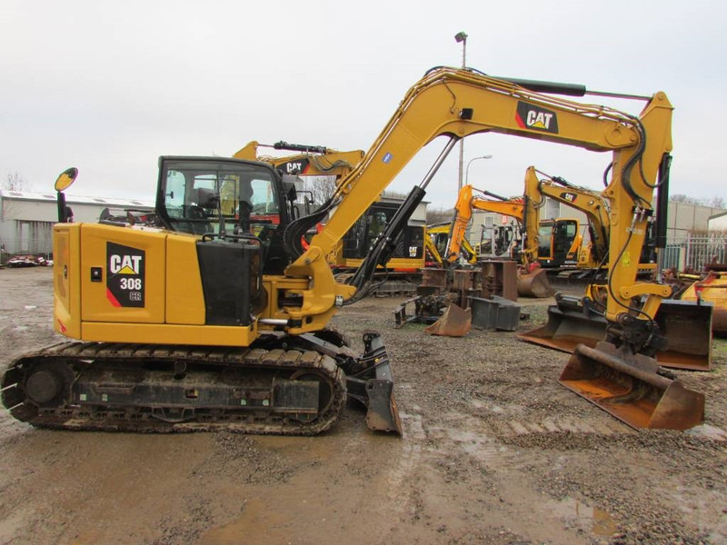 Cat 308 CR Kettenbagger / 59.900 EUR - Minikuormaaja: kuva Cat 308 CR Kettenbagger / 59.900 EUR - Minikuormaaja Cat 308 CR Kettenbagger / 59.900 EUR - Minikuormaaja: kuva Cat 308 CR Kettenbagger / 59.900 EUR - Minikuormaaja